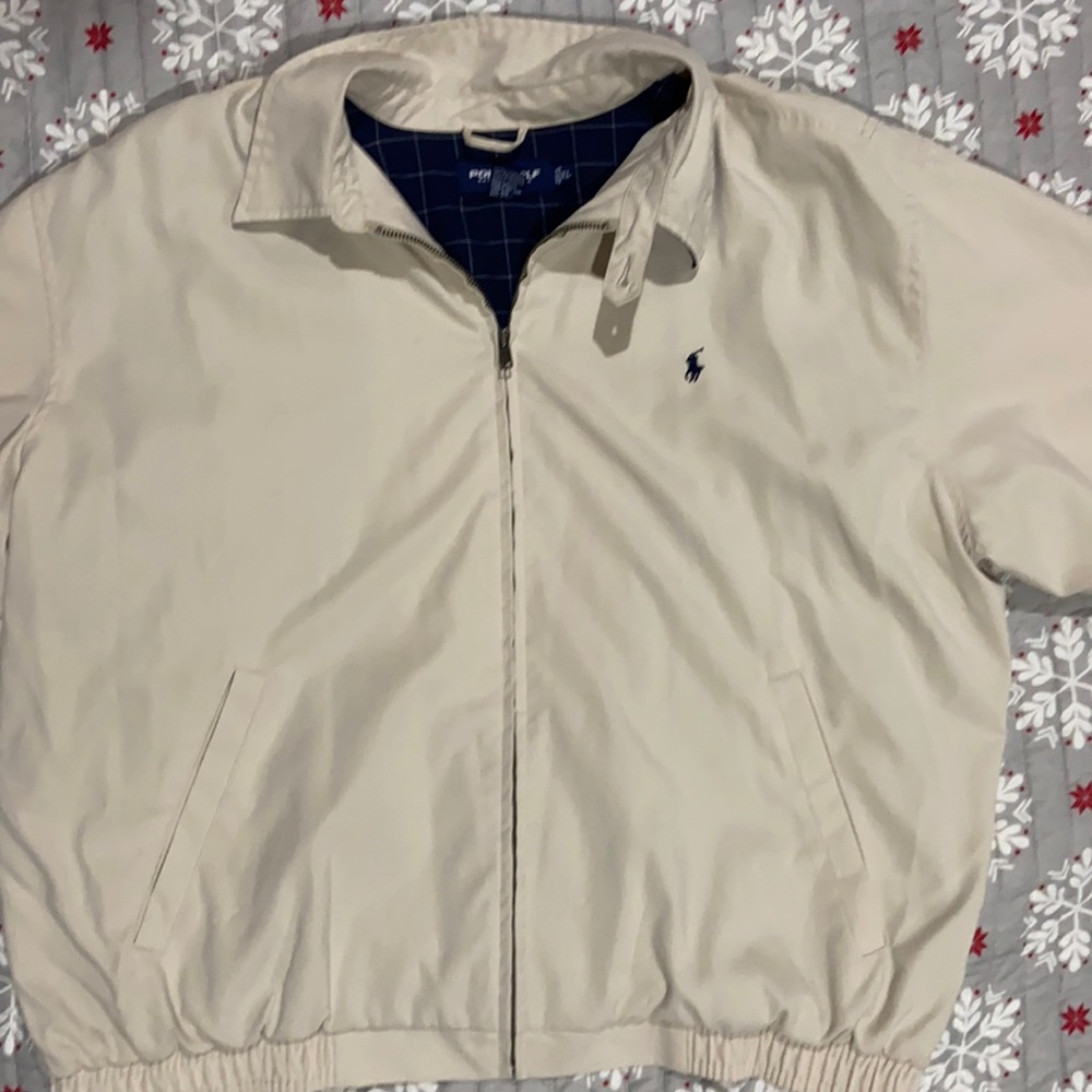 Cream men’s “Polo Golf” by Ralph Lauren.